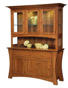 a wooden hutch with glass doors and flowers on it's top shelf, against a white background