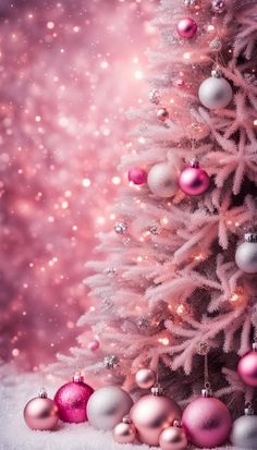 a christmas tree with pink and white ornaments