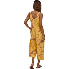 We step into our Garden Island Jumpsuit for romping around summer festivals and quaint beach towns. The wrinkle-resistant fabric unpacks nicely when we arrive at our destination, and the cropped style pairs nicely with flats and wedges. We keep cool with the flowy legs, v-back design, and breathable material. Casual Cotton Jumpsuits And Rompers For Beach Season, Casual Cotton Jumpsuits For Beach Season, Casual Beach Jumpsuits And Rompers For Spring, Comfortable Summer Beach Jumpsuits And Rompers, Comfortable Beach Jumpsuits And Rompers For Summer, Comfortable Sleeveless Summer Jumpsuits And Rompers, Summer Relaxed Fit Jumpsuits And Rompers For Beach Season, Summer Cotton Jumpsuits And Rompers For Vacation, Relaxed Fit Jumpsuits And Rompers For Beach