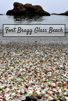 an image of a glass beach with rocks in the background and text that reads, fort brag glass beach