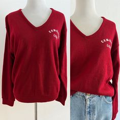 "Charming 70's red v-neck letterman style sweater.  Embroidered \"C.K. McClatchy Lions\" Acrylic, rayon Size medium Armpit 19\" Shoulder to hem 34\" Excellent condition" V-neck Tops For College In Winter, Cotton V-neck Sweater For College, Fall College V-neck Tops, Casual V-neck College Sweatshirt, Fall V-neck Tops For College, Collegiate Red Sweater For Fall, Red Collegiate Cotton Sweater, Sporty Cotton V-neck Sweater, Cotton V-neck College Sweater