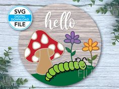 a wooden sign that says hello with a caterpillar on it and flowers in the background