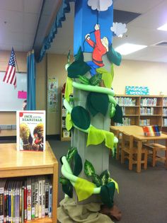 a library with bookshelves, desks and children's bookcases