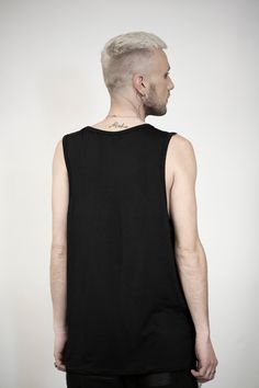 Black viscose top/tank designed with transparent net. The model on the picture is wearing size M. His height is 181. Normal wash. Collection 'DISTRESSOR' Spring 2021 Tank Top Men Fashion Street Styles, Punk Streetwear Stretch Tank Top, Mens Black Tank Top, Loose Tank Top Men, Men’s Tank Top Fashion, Alternative Men, Apocalyptic Clothing, Cyberpunk Clothes, Tank Design