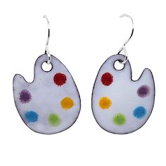 These artist palette earrings are fun and colorful, and they will brighten up your day! They are made out of glass enamel fused in a kiln to a copper base.  The ear wires at the top are solid sterling silver. The rainbow of colors on the paint palettes make them easy to match to many outfits, and the bright white base helps them stand out no matter what you hair color is :) They make a great gift for artists and painters, as well as art and elementary school teachers.  Really they can be worn by Artsy Enamel Earrings As Gift, Artistic Enamel Earrings, Artistic Enamel Earrings Nickel-free, Hand Painted Artsy Enamel Earrings, Hand Painted Enamel Artsy Earrings, Artistic Colorful Earrings, Paint Palettes, Artist Palette, Message Jewelry