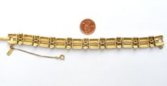 Designer Signed Fashion Jewelry - This is a well made vintage gold tone bracelet by Monet. It is 7.5" long, .63" wide, has safety chain, signed Monet on clasp and on hanging tag, great condition with slight wear on the inside. Vintage Monet, Safety Chain, A Well, Hang Tags, Vintage Gold, Gold Bracelet, Gold Tones, Fashion Jewelry, Bracelet