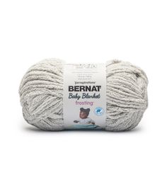 bernat baby blankets trotting yarn ball in grey, white and gray colors