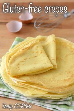 there are three tortillas on the plate with eggs in the background and text overlay that says gluten - free creps