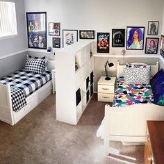 a bedroom with a bed, desk and pictures on the wall next to each other