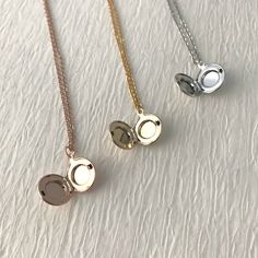 Dainty Round Pendant Locket Necklace With Adjustable Chain, Dainty Locket Necklace With Adjustable Chain, Dainty Medallion Locket Necklace With Adjustable Chain, Elegant Adjustable Locket Necklace With Round Pendant, Rose Gold Locket Necklace With Round Pendant, Elegant Adjustable Round Pendant Locket Necklace, Rose Gold Round Locket Necklace, Delicate Rose Gold Medallion Jewelry, Elegant Adjustable Locket Charm Necklace