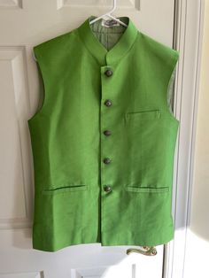 38 size Nehru Vest - Small  Lime Green by Ahemdabad designer Nautanky Traditional Green Kurta For Work, Spring Sleeveless Fitted Nehru Jacket, Traditional Sleeveless Green Nehru Jacket, Sleeveless Green Traditional Nehru Jacket, Traditional Nehru Jacket For Spring Workwear, Traditional Fitted Nehru Jacket For Spring, Fitted Festive Vest For Spring, Green Fitted Nehru Jacket For Spring, Fitted Green Nehru Jacket For Spring