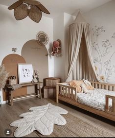 a bedroom with a canopy bed and rugs on the floor, walls and ceiling