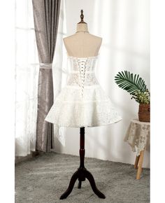 Get 10% off now! Buy unique white lace corset top short party dress at cheap price online. Free stable shipping and pro custom service since 2009. White Lace Bodice Corset Dress For Summer, White Wedding Corset For Spring, Summer Wedding Corset Dress With Lace Bodice, Sleeveless Lace Corset Dress For Homecoming, White Lace Bodice Corset For Summer, Lace Mini Length Corset Dress For Party, Lace Corset Dress For Prom And Homecoming, Lace Mini Dress With Boned Bodice For Wedding, Lace Dress With Corset Back For Homecoming