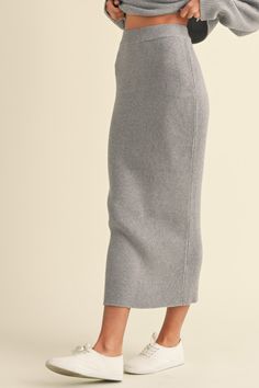 Cyrus Skirt Heather grey ribbed knit midi skirt. Elastic waistband Fitted A matching set with the Cyrus Sweater Viscose/Poly Blend | Model is wearing a Small Knit Midi Skirt, Corset Crop Top, Frankies Bikinis, Long Skirts, Crop Top Sweater, Knit Midi, Blazer Coat, Vest Dress, Western Wear