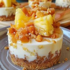 a dessert with pineapples and other toppings on a plate