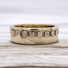 Experience the timeless elegance and rich cultural legacy of Italy with our exclusive Coin Ring Italy. Handcrafted from authentic Italian coins, each ring is a unique piece of jewelry that captures the essence of this iconic Mediterranean nation. These rings are more than just accessories; they are a tribute to Italy's profound history, artistic achievements, and passion for beauty and craftsmanship. Our skilled artisans carefully preserve the intricate details of each coin, showcasing symbols that resonate with Italian identity--such as the laurel wreaths of ancient Rome, representing victory and honor, or the iconic imagery of the Italian Republic. Wearing the Coin Ring Italy connects you to the heart of Italian culture, evoking the grandeur of Rome's ancient ruins, the beauty of the Tus Etched Promise Ring Jewelry, Symbolic Brass Engraved Ring For Wedding, Traditional Gold Jewelry With Engraving Option, Yellow Gold Brass Promise Ring, Traditional Engraved Ring With Engraving Option, Symbolic Brass Engraved Ring For Anniversary, Ceremonial Gold Engraved Ring With Engraving Option, Symbolic Engraved Brass Ring For Anniversary, Symbolic Engraved Rings For Ceremonial Occasion