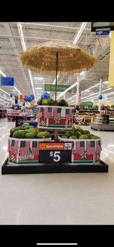 an umbrella in the middle of a grocery store