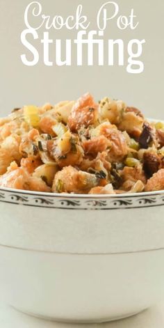 a white bowl filled with stuffing on top of a table