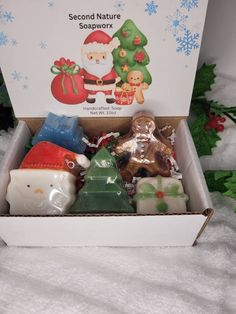 This gift set is a perfect assortment of 5 different shaped/scented soaps all boxed and tied with a bow ready for gift giving.  Children and the young at heart will love receiving this set!  Combined net weight of soaps is approximately 10 oz and is scented as follows:  Santa- Candy Cane, Gingerbread - Christmas Spice, Tree - Sleigh Ride, Snowflake - Fresh Snow and Package - Elf Sweat.  Order some fun for that special person on your list! Christmas Soap Target, Home Made Christmas Soap, Soap Gift Baskets For Christmas, Soap Christmas Gifts, Christmas Soap Gift, Christmas Soaps, Candy Cane Gingerbread, Christmas Soap, Christmas Gift Set