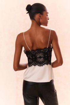 Romance redefined in the Talulah Top. Designed from a luxurious polyester satin, this flirty top begins with a chic color blocking detail while the bodice features intricate Victorain-inspired lace, lined with chiffon for a subtly sheer effect for a sexy touch. A discreet side seam zipper offers easy wear. Shell: 100% Polyester Lace: 100% Nylon Lining: 100% Polyester Dry clean only Lace Trim Cami Top, Flirty Tops, Lace Trim Cami, Hair Sale, Fleece Sweater, Polyester Satin, Sweater Sale, Cami Top, Skirts For Sale