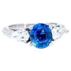 GIA Certified: 2.13ct. Natural No Heat blue sapphire ring. Full cut brilliant oval cut Clean clarity Transparent and vibrant top Bright Gem Royal Blue 7.92 X 6.94 x 4.27mm Report # 1206133411 .70ct. Natural Diamonds Pears, full cut G-color vs-2 clarity .60ct. Natural Diamonds Rounds, full cut G-color vs-2 clarity Platinum 8.5 Grams Ring Depth 9mm Current ring size: 7 May resize, please inquire $55,000 appraisal will accompany Blue Oval Sapphire Ring With Vvs Clarity, Oval Blue Sapphire Ring With Vvs Clarity, Gia Certified Oval Lab-created Sapphire Ring, Golden Rings, Blue Sapphire Ring, Golden Ring, Diamonds Ring, Sapphire Diamond Ring, Blue Sapphire Rings