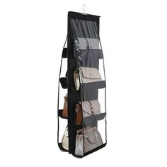 an over - the - door hanging purse organizer with multiple pockets and compartments, black