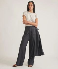 Flora High Waisted Trouser – Marine Layer Chic Pleated Relaxed Fit Wide Leg Pants, Chic Pleated Wide Leg Pants With Relaxed Fit, Chic Wide Leg Pleated Pants With Relaxed Fit, High-waisted Relaxed Fit Cotton Culottes, Wide Leg Pleated Culottes For Work, Casual Pleated Wide-leg Culottes, Pleated Wide Leg Culottes For Work, Cotton Wide Leg Pants For Day Out, Chic Relaxed Fit Cotton Wide Leg Pants