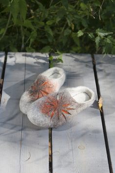 Felted slippers in grey and brown and orange. These cute slippers are bestsellers of all the time at JurgaFeltLife shop just in other, orange coloration. We call them Sand Sun Flowers. They are made of natural, organic wool with a little bit of colored wool. These natural woolen clogs are made by hand, using an ancient technique. Colors of slippers: grey, brown, tan, white smoke, ivory. Felt is a perfect material for footwear. It is extremely wear-proof and warm. When you put them on, you won't Orange Non-slip Casual Slippers, Gray Non-slip Closed Toe Slippers, Orange Slip-on Casual Slippers, Casual Orange Slip-on Slippers, Gray Closed Toe Slippers With Rubber Sole, Sunburst Pattern, Sun Flowers, Cute Slippers, Brown And Orange