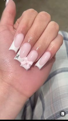 Pink Heart On Nails, Nails With The Letter M On Them, Initial Nails Aesthetic, Light Pink Nails Coquette, Pretty Girly Nails, White On Pink French Tip, Acrylic Nails With Bf Initials Short, Nails A Initial, Simple Initial Nails