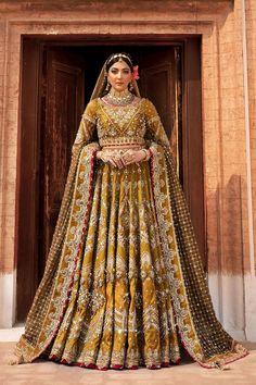 Buy Pakistani Bridal Choli with Mustard Lehenga in premium quality Raw silk. Motifs, crystals, gota, and zari make this Lehenga Choli an epitome of beauty. Mnr Bridal Dress, Mustard Lehenga, Bridal Choli, Matching Lehenga, Mehndi Bridal, Sajjal Ali, Pakistani Bridal Dress, Raw Silk Fabric, Bride Outfits