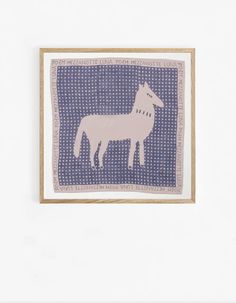 a blue and white painting with a horse on it's side in a wooden frame