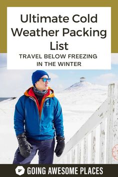 a man standing on top of a snow covered slope next to a wooden fence with the words, ultimate cold weather packing list