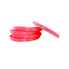 pink round rubber bands on white background