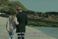 a man and woman standing on top of a beach next to the ocean with a quote written in front of them