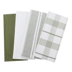 three white and green towels on top of each other, one with a checkered pattern