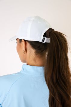 Fairway Bombs Hat Color: White/Navy UPF 50+ protection Performance polyester fabric Adjustable band L210P-FRWYBOMBS-WHT/NVY Sporty Brimmed Sports Hat, White Baseball Cap With Uv Protection For Sports, White Sporty Hat With Uv Protection, Sporty White Hat With Uv Protection, Functional White Hats With Upf 50+, Sporty Hats With Uv Protection Curved Visor, Functional White Hat With Upf 50+, White Baseball Cap For Outdoor, Functional White Hat With Curved Visor