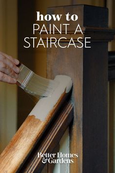 someone painting a stair case with the words how to paint a staircase