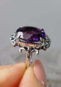 Purple Oval Amethyst Ring With Filigree, Oval Purple Amethyst Ring With Filigree, Oval Purple Filigree Amethyst Ring, Purple Oval Filigree Rings, Oval Amethyst Ring With Intricate Design, Oval Amethyst Ring With Filigree Detail, Oval Purple Ring With Intricate Design, Purple Oval Ring With Intricate Design, Ornate Oval Amethyst Gemstone Ring