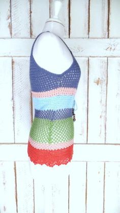 "90s vintage blue/green striped crochet knit cotton sleeveless tank top Measurements... taken flat -marked size: no label -estimated fit: small -bust: 16.5\" (41.9 cm) -length: 25\" (63.5 cm) Features... -crochet cotton knit -beaded waist tie -unlined Condition... -great vintage condition -light wear/fading RF1769" Sleeveless Striped Tops For Beach Season, Green Vest For Beach In Summer, Multicolor Cotton Tank Top For Beach, Green Cotton Tank Top For Beach Season, Casual Green Vest For The Beach, Multicolor Crochet Tank Top For Spring, Blue Cotton Crochet Top For Summer, Green Summer Vest For Beach, Multicolor Cotton Tank Top For Beach Season