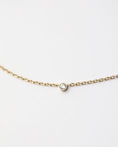 Personalized Asymmetrical 14k solid gold initials necklace with small diamond bezel. Simple, minimalist everyday necklace Perfect wearing alone or layering with your favorite necklaces. * Letter measures approx. 4.8mm * Material: Available in 14K Yellow Gold or 14K White Gold * Diamond: 0.03ct. VS Clarity F-H color * Leave us your initial and placement in the comment box at checkout. Minimalist 14k Gold Diamond Necklace With Bezel Setting, Dainty Everyday Jewelry With Smooth Bezel, Minimalist Diamond Initial Necklace For Everyday, Dainty Necklace With Single Diamond Initial Pendant, Dainty Initial Pendant Necklace With Single Diamond, Minimalist Yellow Gold Solitaire Necklace With Smooth Bezel, Dainty Single Diamond Initial Pendant Necklace, Minimalist Diamond Necklace With Delicate Chain For Everyday, Everyday Minimalist Diamond Necklace With Delicate Chain