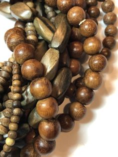 "16\" full strand of natural Robles wood beads. Made in the Philippines. They are round in shape but not perfectly round. The beads on each strand are uniform. Hole sizes: 5mm - 1mm 6mm - 1mm 8mm - 2mm 10mm - 3mm Find more natural bead strands here: https://www.etsy.com/shop/thebeadgalleryA2 Processing time: 1-3 days Shipping: 2-5 days standard USPS shipping methods" Natural Wood Beaded Bracelets With Round Beads, Natural Wood Beaded Bracelets, Brown Wooden Beads Bracelet, Brown Wooden Bracelets With Round Beads, Brown Wood Beaded Bracelets With Round Beads, Brown Wooden Beaded Bracelets With Round Beads, Brown Wood Beaded Bracelets, Brown Wooden Beaded Bracelets, Brown Wooden Beaded Round Bracelets