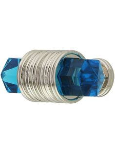 a stack of rings with blue crystal stones on each end and silver wire wrapped around the ends