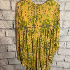 Size Xs Nwot Orange And Green Print Mini Dress Button Closure In Back Buttons On Cuffs Of Sleeves Material: 67% Polyester, 33% Viscose Measurements: Length 34” Yellow Long Sleeve Mini Dress For Beach, Summer Orange Mini Dress With Long Sleeves, Yellow Long Sleeve Dress With Boho Print, Yellow Long Sleeve Boho Print Dress, Long Sleeve Yellow Dress With Boho Print, Long Sleeve Yellow Boho Print Dress, Beachy Maxi Dress, Long Sleeve Denim Dress, Dress With Puffy Sleeves