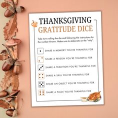 a thanksgiving greeting card with an image of leaves and acorns next to it