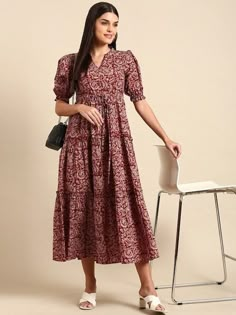 Please check the last image for a detailed size chart FEATURES Red floral print a-line dress V-neck Short, puff sleeve Midi length in the flared hem Material & Care 100% Pure Cotton Hand-wash Style: Indian Dress, Dresses For Women, Midi Dress For Women, Fusion Dress, Indowestern dress Dispatch within 7 days Maxi Dress Indian, Kurti Palazzo, Beautiful Midi Dresses, Stylish Kurtis Design, Ethnic Dress, Midi Dress Casual