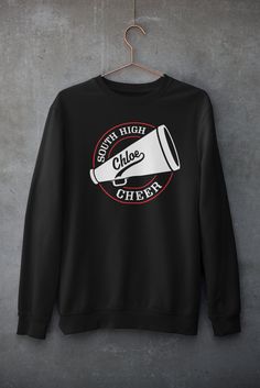 Personalized Cheer Shirt. This design can be customized with your text, team/school name and colors. Ask about group pricing! See Size Charts in the photos for sizing. Printed on a Black Heavyweight Crew Neck Sweatshirt Features: 8 oz./yd² (US) 13.3 oz./L yd (CA), 50/50 cotton/polyester, 20 singles Heather Sport colors: 60/40 polyester/cotton 2-end midweight fleece fabric Classic fit Air jet yarn for softer feel and reduced pilling Double-needle stitching at shoulders, armholes, neck, waistband Cheer Tshirt Ideas, Varsity Crew Neck T-shirt For Team Events, Team-colored Crew Neck T-shirt For Cheerleading, Fan Apparel T-shirt With Team Name For Cheerleading, Sports Season Cheerleading T-shirt With Team Name, Fan Apparel T-shirt With Screen Print For Cheerleading, Sports Season Cheerleading Team T-shirt, Black T-shirt With Team Name For Cheerleading, Cheerleading Team T-shirt For Sports Season