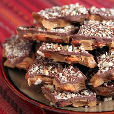 a plate filled with chocolate and nuts on top of a table