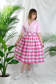 Magenta /cerise pink and white check high waist full gathered skirt. Perfect for casual outfits and special ocasions with pair of trainters or high heels. 100% cotton.  Elastic at the back of waist.  Two side pockets. Midi lenght about 70cm + 5 cm waistband. Handmade in UK.  Model wears size S.  HOW TO CHOOSE A SIZE ?   Using a measuring tape, measure the smallest part of your waist.  SIZE CHART: (CM) XS - W: 66 CM S - W: 70 CM M - W: 74 CM  L - W: 78 CM  XL - W: 82 CM  CARE INSTRUCTIONS: Hand w Fitted Gingham Skirt For Summer, Gingham Skirt For Summer Picnic, Summer Gingham Skirt For Picnic, Summer Plaid Pleated Skirt, Chic Gingham Skirt For Summer, Spring Gingham Skirt For Day Out, Summer Lined Skirt For Picnic, Pink Gathered Skirt Dress For Spring, Fitted Cotton Skirt For Picnic