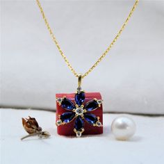 "10K 14K 18K Solid Gold, Sapphire Daisy Necklace, Daisy Necklace, Sapphire Jewelry,, Gold Flower Pendant, Delicate Necklace, Shiny Necklace * Made to Order * Material: 10K 14K 18K Solid Gold * Pendant height: 17 mm * Pendant width: 15 mm * Gold Color : Yellow Gold,White Gold,Rose Gold * Gemstone : 6 Pcs. 5x3mm Pear Cut, Lab-Created Sapphire * Additional Sones : Cubic Zirkonia * Ready to Ship in 1-3 Business Days * The product includes 14 karat solid gold chain Chain Length 14 inches adjustable 1 Yellow Gold Gemstone Necklace In Flower Shape, Yellow Gold Flower-shaped Gemstone Necklace, Gold Gemstone Necklaces With Flower Design, Gold Flower Shaped Gemstone Necklace, Flower Shaped Necklace With 17 Jewels For Gift, Exquisite Flower Shaped Necklace For Gift, Shiny Necklace, Pendant Delicate, Necklace Sapphire