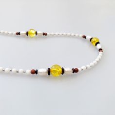 This beaded coral necklace can be styled as rope necklace, lariat necklace, classic necklace, or even a bracelet and glasses chain. Create your own Return to Origin style with your favourite chains, tassels, and pendants. ⚜ Return to Origin Yellow Jade Beaded Chain ❀ Natural White Coral 4mm❀ Sterling Silver Claps and Beads 2mm❀ Manmade Amber 10mm❀ Fresh Water Pearl 6-10mm❀ Rosewood Spacer and Gold Sandstone❀ Beaded Chain 32 in.❀ Multiple Styles❀ Black Glasses Chain Connectors May this necklace b Chinese Meditation, Black Glasses, Yellow Jade, Classic Necklace, White Coral, Coral Necklace, Glasses Chain, Rope Necklace, Jade Beads